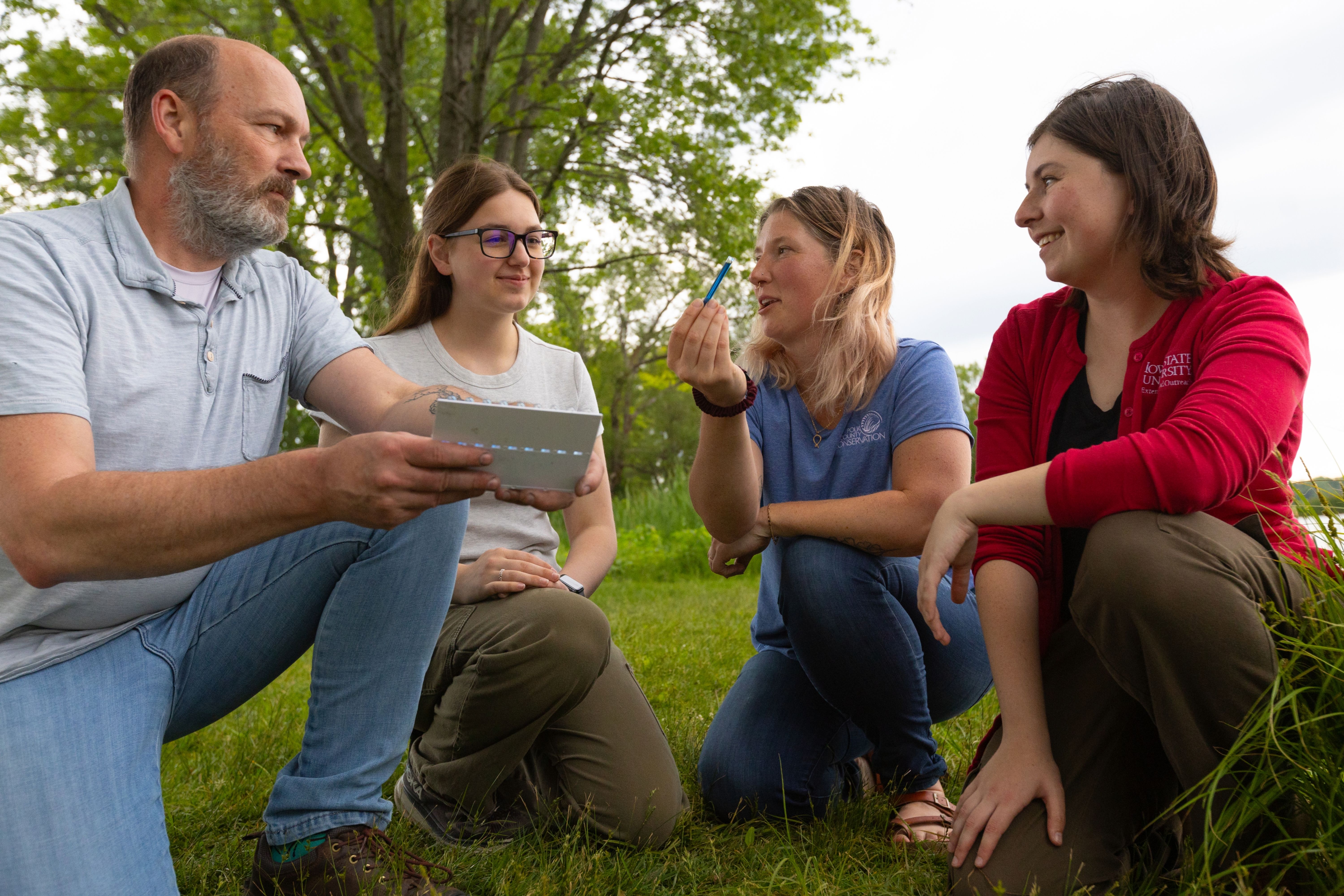 Master Conservationist program participants read water sample results