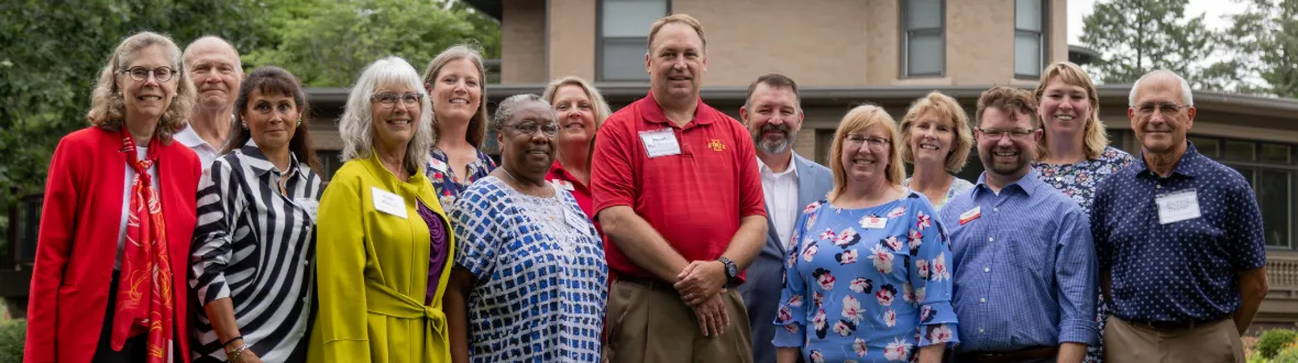 Vice President Jason Henderson and ISU President Wendy Wintersteen with council members at Henderson's welcome reception