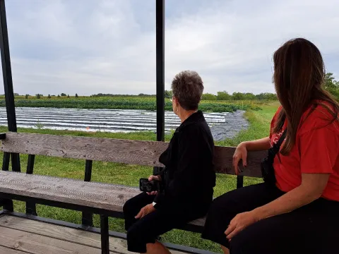 Participants view garden plots at the ISU Horticulture Research Station.