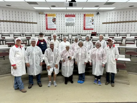 Tour Group D at the ISU Meat Lab classroom.