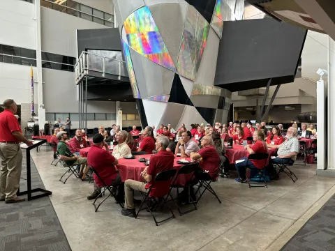 ECDC participants listen to Vice President Henderson's keynote speech during lunch.