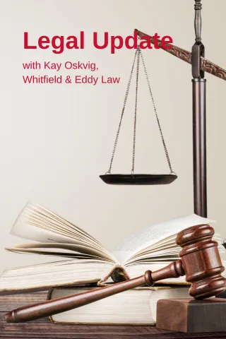 Legal scale and law books with text Legal Update with Kay Oskvig, Whitfield & Eddy Law